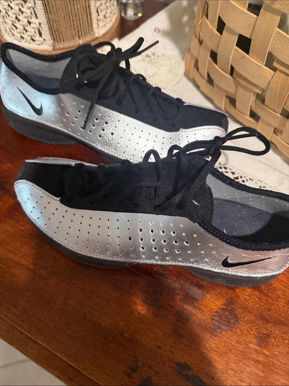 Nike women’s Black and Silver Low-Profile Athletic Trainers